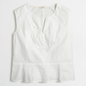 White sleeveless top